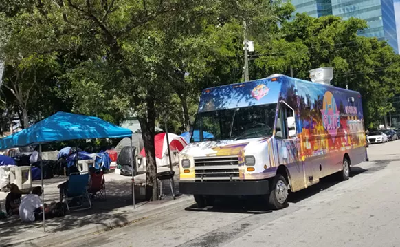Image: 3-0-Slide Food Truck Feeds Fort Lauderdale Homeless Population