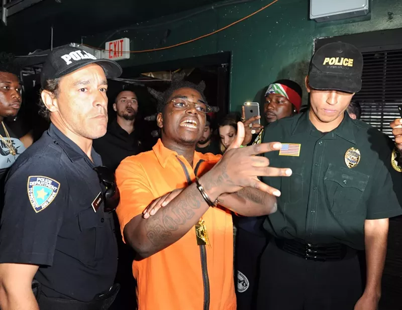 Image: Kodak Black poked fun at his legal problems when he posed as a prisoner before his show at the Watsco Center in 2017.