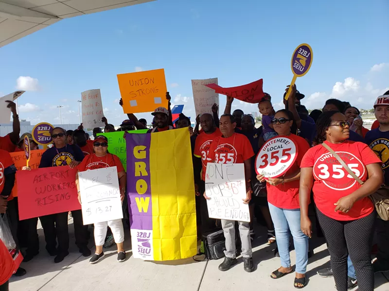 Image: First, airport workers fought for a higher living wage. Now, they've turned their attention to advocating for an increased healthcare differential.
