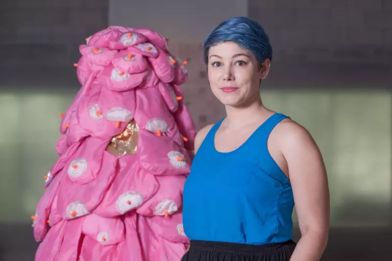 Image: Jenn Clay next to one of her perfomative sculptures.