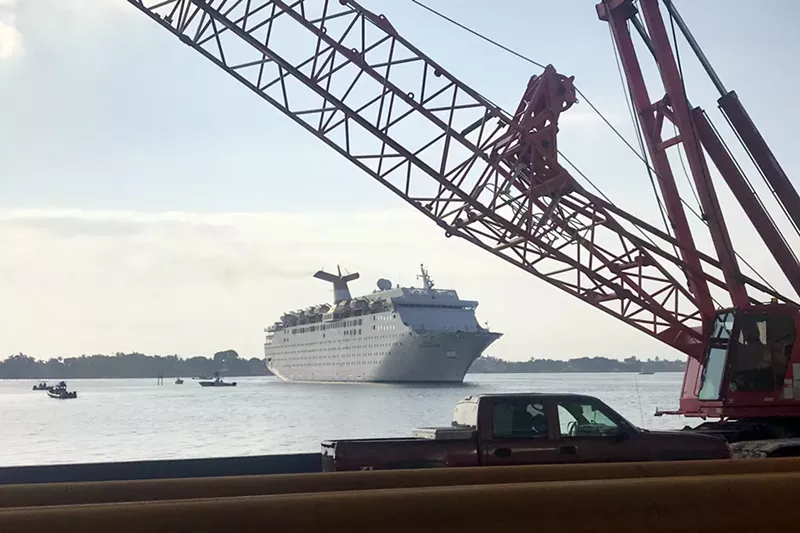 Image: The Grand Celebration approaches the Port of Palm Beach on Saturday, carrying Bahama residents evacuating from the hurricane-devastated islands.