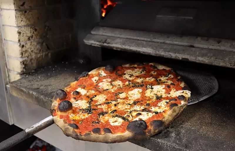 Image: The Margarita apizza is one of the top sellers at Ah-Beetz in Delray Beach.