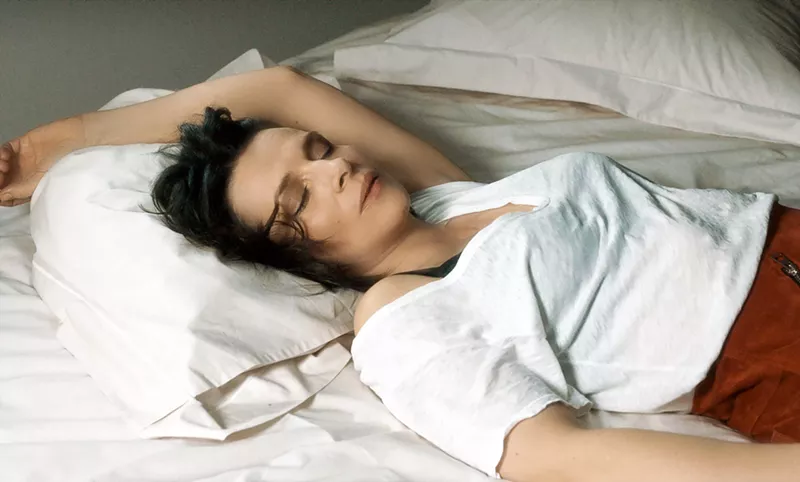Image: In director Claire Denis' Let the Sunshine In, Juliette Binoche plays Isabelle, a middle-aged, divorced painter who seemingly lives comfortably in Paris while orbiting a half-dozen or so potential partners.