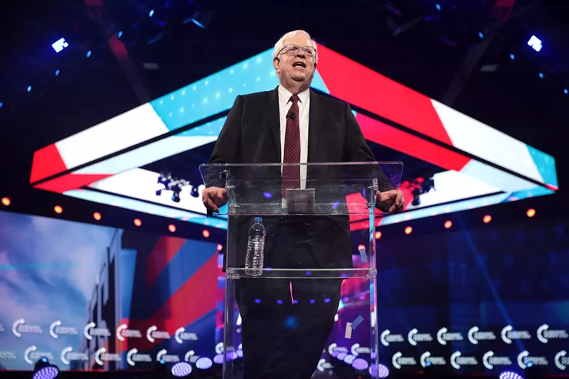 Image: Dennis Prager speaking with attendees at the 2021 AmericaFest at the Phoenix Convention Center in Phoenix, Arizona.