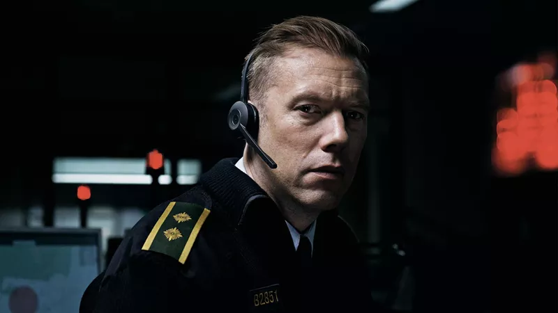 Image: In Danish director Gustav Möller’s The Guilty, Jakob Cedergren plays Asger Holm, a police officer who has been temporarily demoted to working the phones, and is on the line with a woman who is being abducted by her ex-husband.