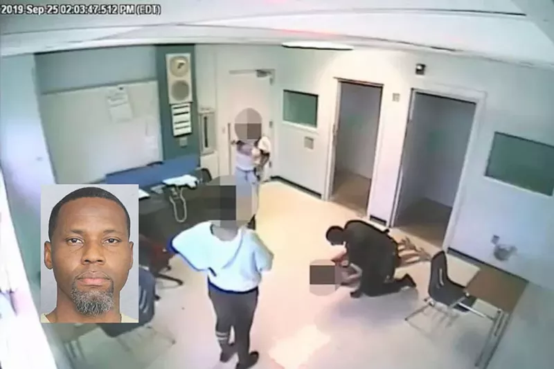 Image: A still image from video showing BSO Dep. Willard Miller allegedly assaulting a teen girl at Cross Creek School.
