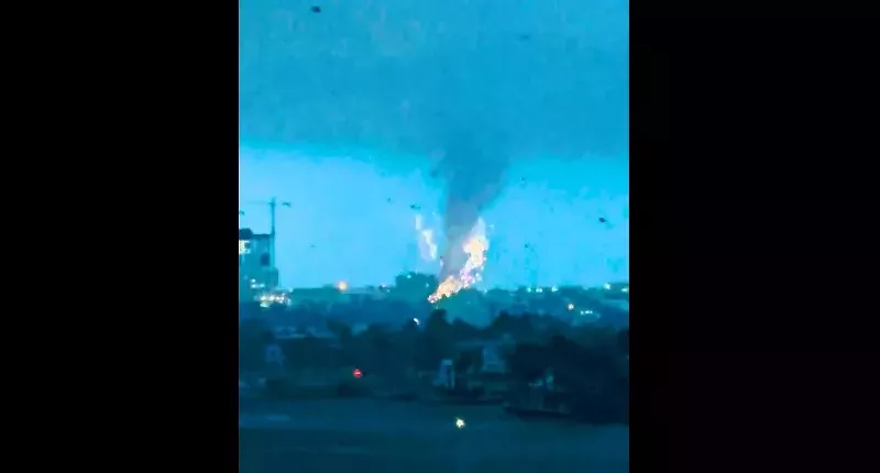 Image: Flames swirl around the wall of a tornado that struck Fort Lauderdale on January 6, 2024.