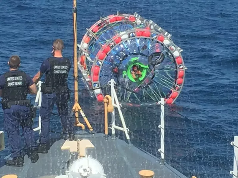 Image: U.S. Coast Guard crews stopped Reza Baluchi (seen sticking his head out of his bubble craft) during his journey from Florida to Bermuda in 2016.