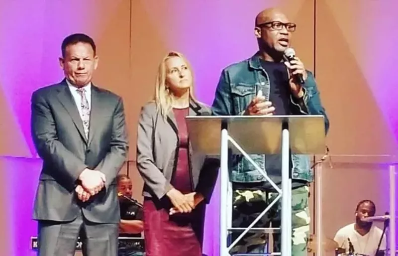 Image: Former Sheriff Scott Israel and wife Susan with Pastor Allen B. Jackson.