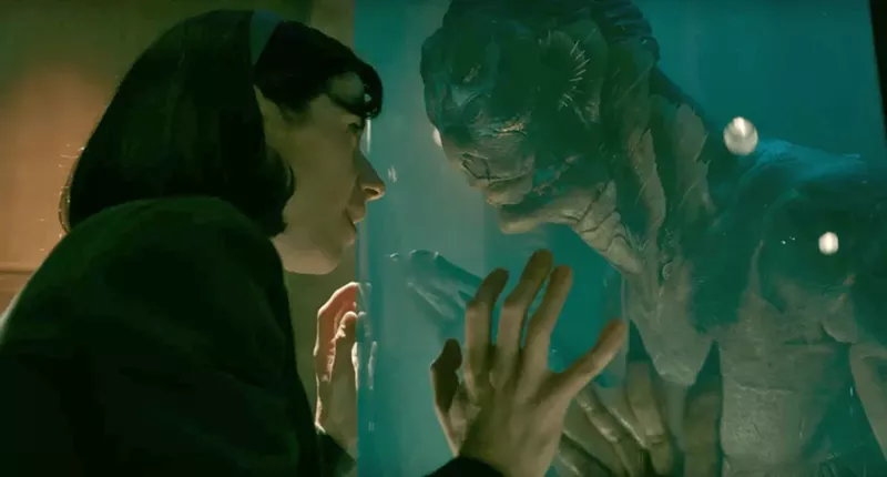Image: In Guillermo del Toro's The Shape of Water, Sally Hawkins plays Elisa, a mute dreamer who finds herself drawn to to a lizard-man that was captured in South America.