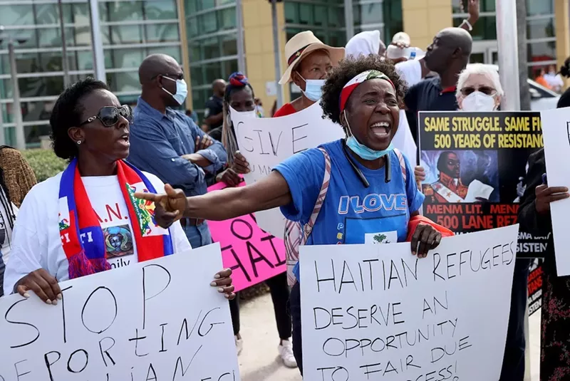 Image: Protesters gathered in Miami on September 22 to denounce the expulsion of Haitian refugees.