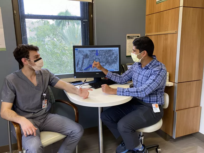 Image: Urologist Dr. Ranjith Ramasamy (right) with medical student Eliyahu Kresch.