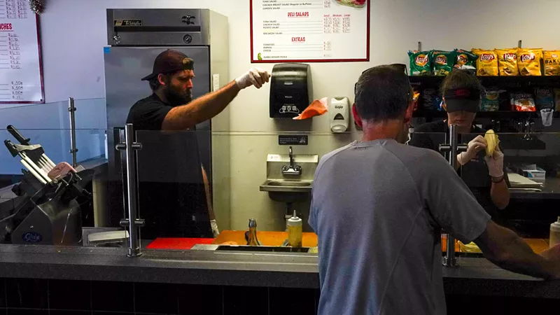 Image: Flying meat touching down on a hoagie landing strip at LaSpada's Original Hoagies in Lauderdale-by-the-Sea, the first of six locations.