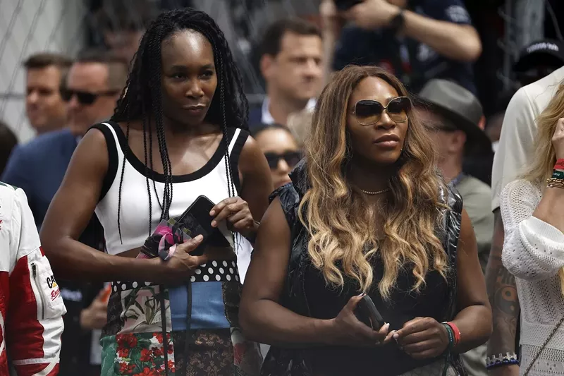 Image: Invest locally: Venus and Serena Williams at the 2023 F1 Grand Prix of Miami