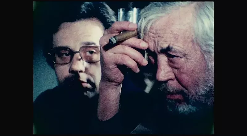 Image: A young Peter Bogdanovich (left) plays the protégé of director Jake Hannaford (John Huston) in The Other Side of the Wind, Orson Welles’ long-lost project that's basically a film-within-a-film-within-a-film.