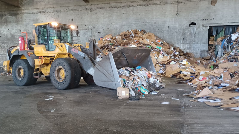Image: Recyclables from across South Florida arrive at the "tipping room" at Waste Management's recycling facility in Pembroke Pines to be sorted and processed for recycling.