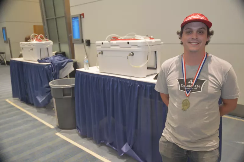 Image: Mike White with the gold medal he accepted on behalf of LauderAle brewery at the Great American Beer Festival in 2017.