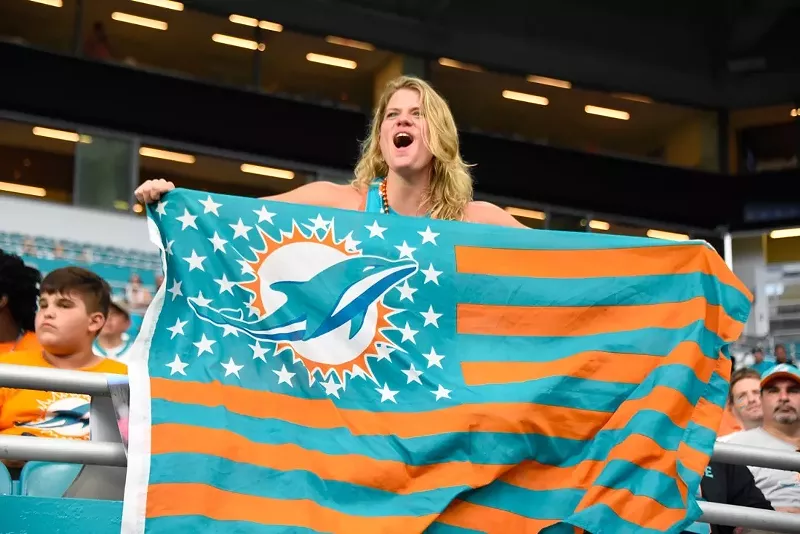 Image: Miami Dolphins fans have some curious tailgate traditions.