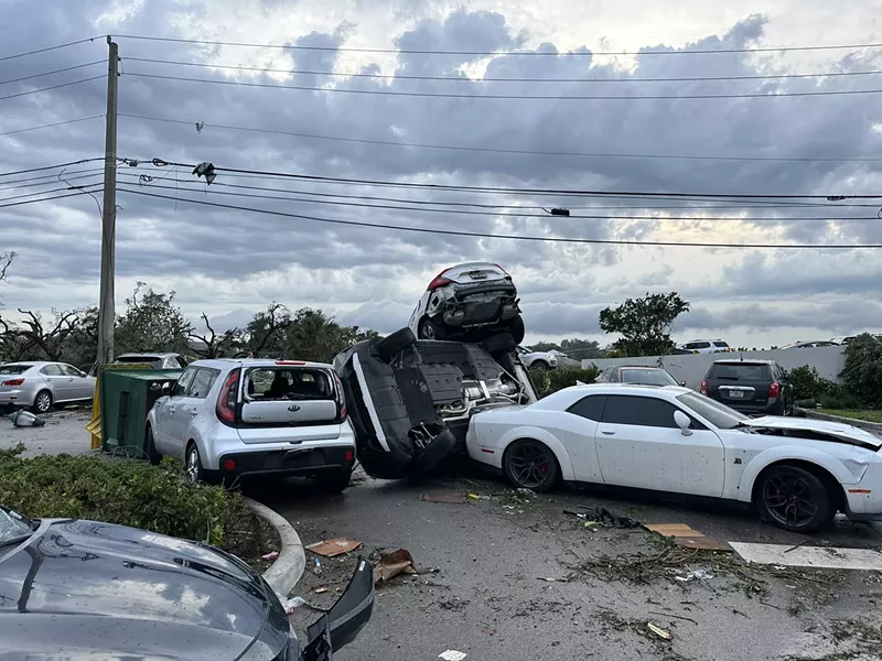 Image: A tornado lifted cars in the air and tossed them about when it passed through Palm Beach Gardens on April 29.
