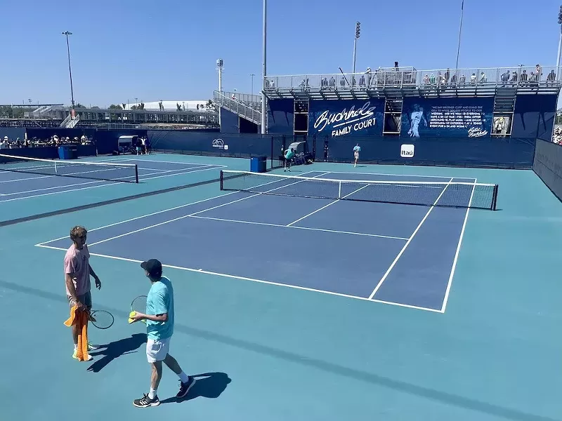 Image: World No. 4 player Alex Zverev warms up on the practice court on Saturday, March 26, 2022.