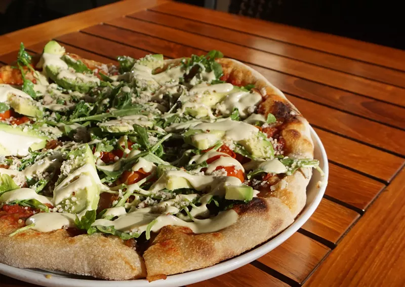 Image: Gourmet avocado pizza at Christopher's Kitchen.