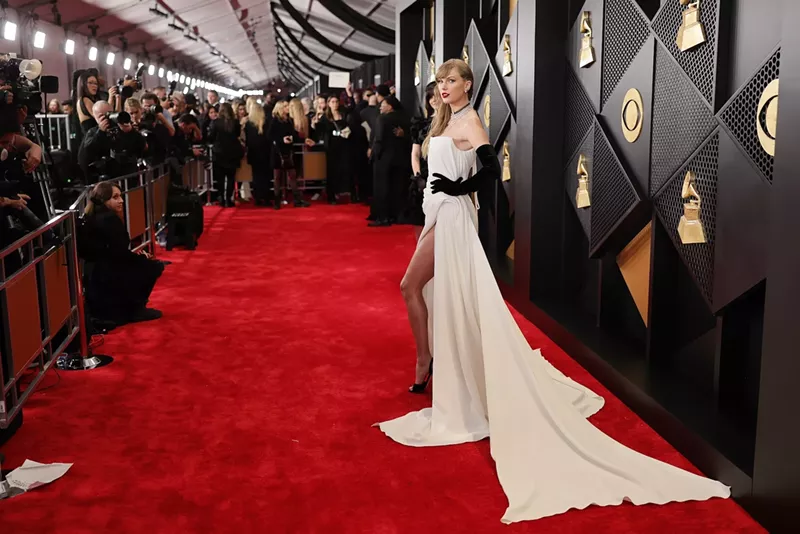 Image: According to University of Miami professor Alyse Lancaster, Taylor Swift, seen here attending the 2024 Grammy Awards in Los Angeles, is more than just a pop star; she's a brand.