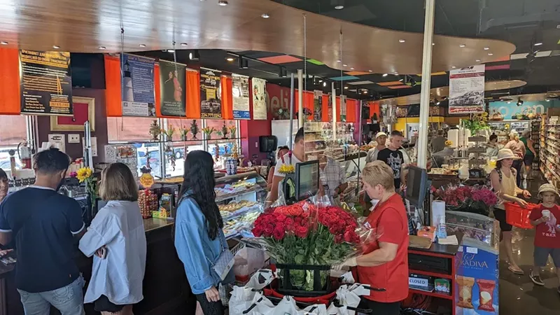 Image: While most customers can agree that Matryoshka Deli Food is the go-to spot for fresh fish and cured meat, they tend to diverge on their opinions on the Russian invasion of Ukraine.