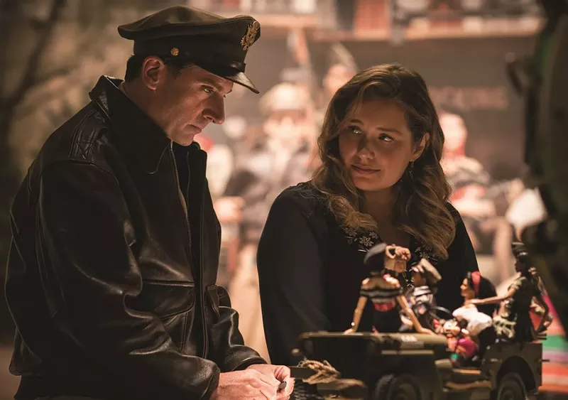 Image: In Robert Zemeckis’ Welcome to Marwen, Steve Carell (left) plays Mark Hogancamp as more of a Gumpian eccentric than an imaginative dude working his way through a tragedy while meeting real-life women such as Roberta (played by Merritt Wever).