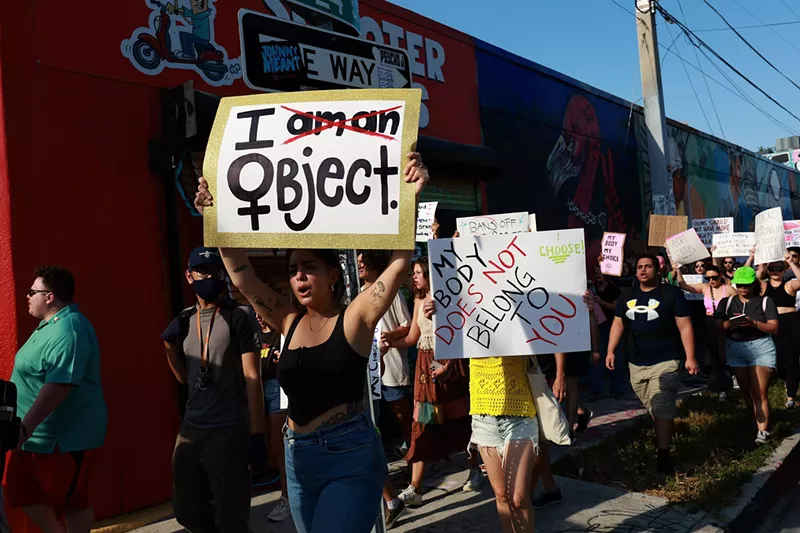 Image: Residents march in Miami to protest the decision in Dobbs v. Jackson Women's Health in June 2022.
