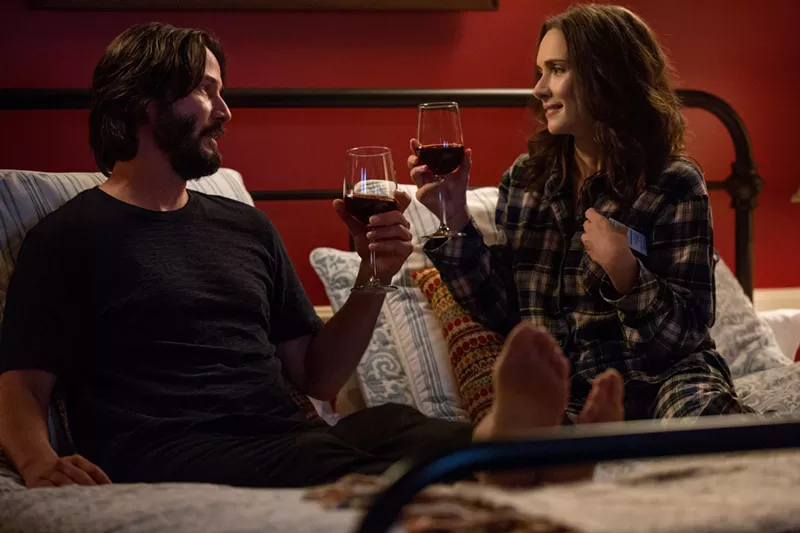 Image: Keanu Reeves (left) and Winona Ryder play two unwanted guests who wind up relating with each other at a Destination Wedding, Victor Levin’s rom-com that leaves the talking to the forever bantering co-stars.