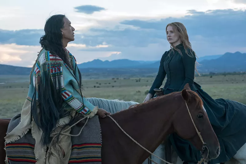 Image: In Woman Walks Ahead, Michael Greyeyes (left) plays Sitting Bull and Jessica Chastain is Caroline Weldon, a “New York liberal” portrait artist on a mission to paint the man of power and vision whose world is being stolen from him.